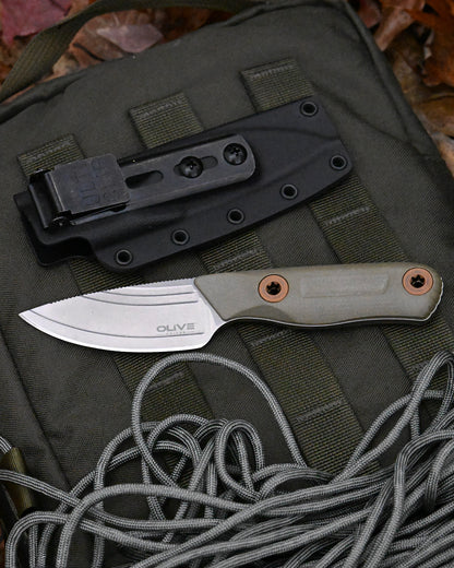 Olive Knives VENARI compact EDC fixed blade knife, Elmax steel — lifestyle, with a tactical bag and paracord
